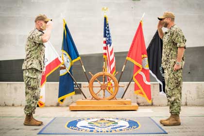 SAN DIEGO (May 29, 2020) " Capt. Matthew McGonigle, a native of Turnersville, New Jersey, left, and Capt. Jack Fay, a native of Scarborough, Maine, right, salute as Fay relieves McGonigle during the Littoral Combat Ship Squadron One (COMLCSRON ONE) change of command ceremony at Naval Station San Diego, May 29. LCS vessels are highly versatile, mission-focused surface combatants designed to operate in the littorals, as well as on the open ocean. U.S. Navy photo by MC2 Alex Corona