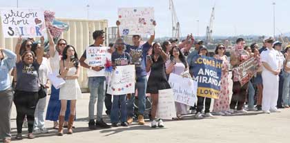NAVAL BASE SAN DIEGO (June 27, 2026) – Families of U.S. Navy Sailors assigned to the Ticonderoga-class guided-missile cruiser USS Lake Erie (CG 70) waves as the ship returns to its homeport of Naval Base San Diego following 11 months of sustained operations at sea in the U.S. 4th Fleet area of operations June 27, 2026. An integral part of the U.S. Pacific Fleet, U.S. 3rd Fleet leads naval forces in the region and provides the realistic, relevant training necessary to execute our Navy’s role across the full spectrum of military operations – from combat operations to humanitarian assistance and disaster response. U.S. 3rd Fleet works together with allies and partners to advance freedom of navigation and overflight, the rule of law, and other principles that underpin security for the region. U.S. Navy photo by MCSN Aaron Sandovalmendoza